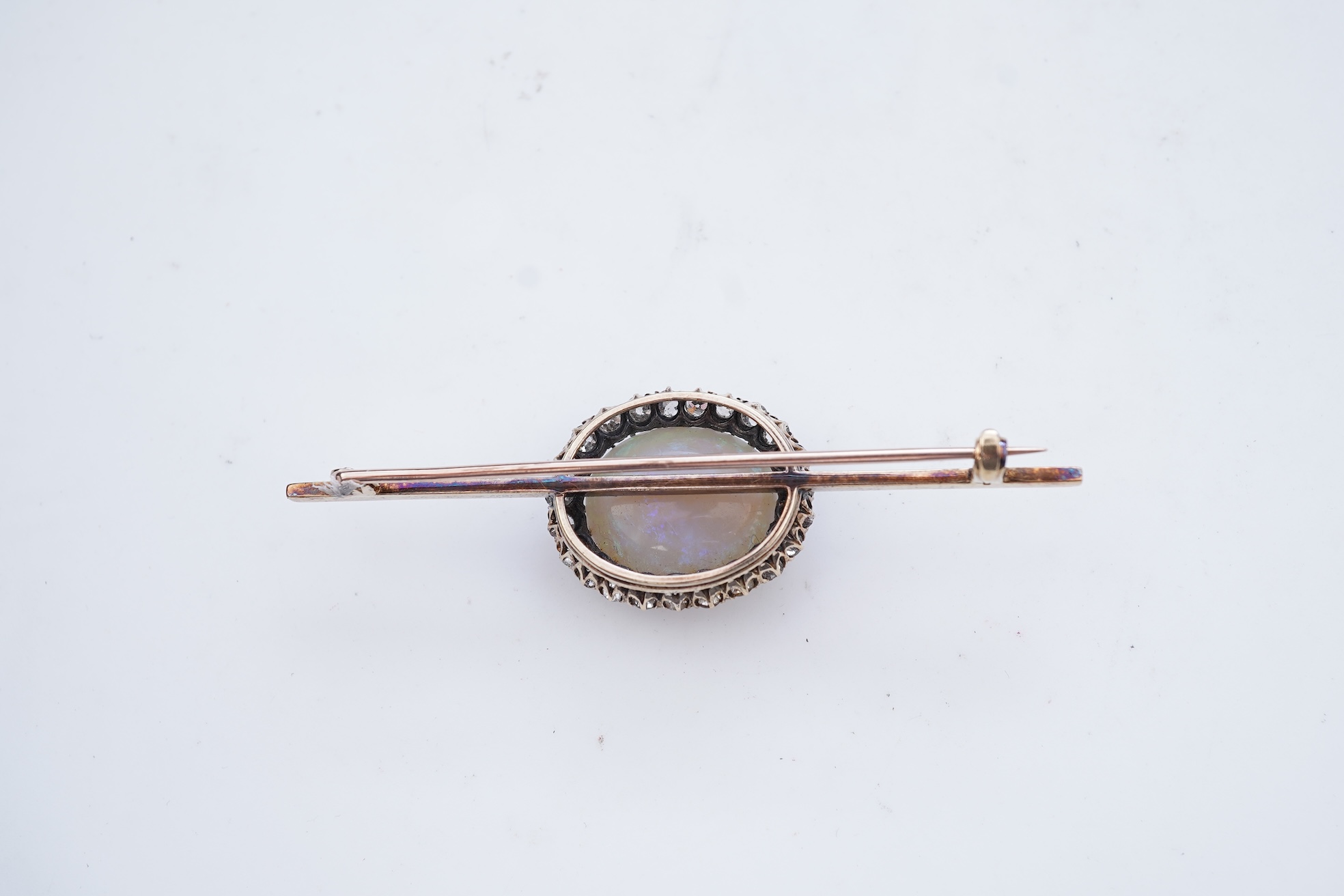 An opal and diamond brooch, circa 1900